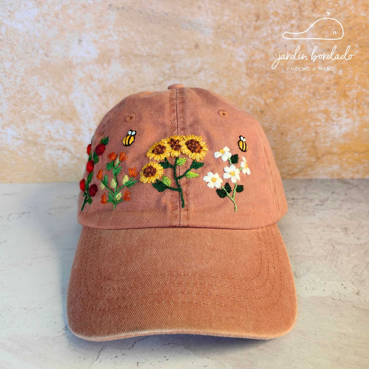 Gorra flores naranja