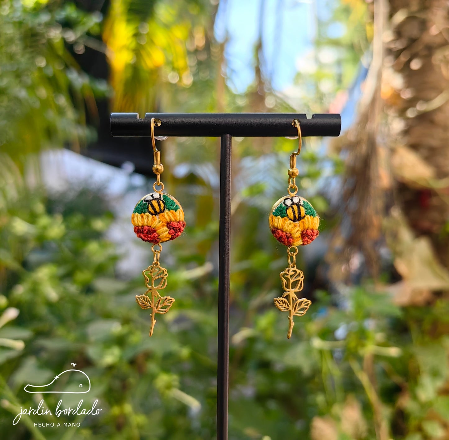 Aretes girasoles rosas