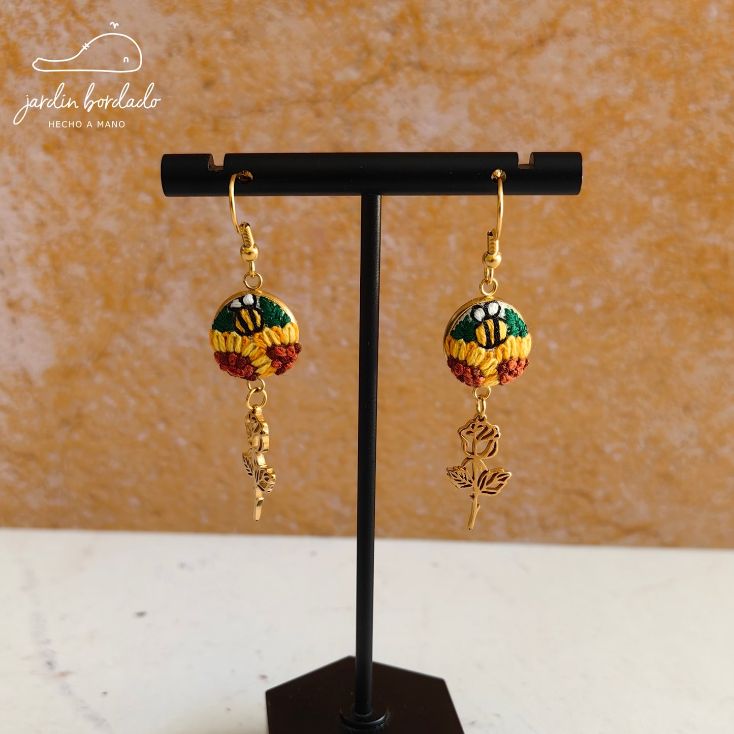 Aretes girasoles rosas